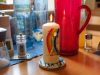Osterkerze an einem Tisch "zuhause" - Osternacht-Morgenfeier 2023